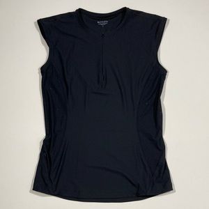 Athleta fitness top with breathable side panels and essentials pocket